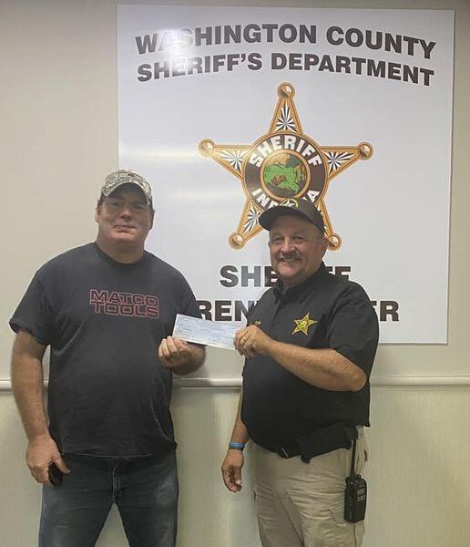 Rusty Newsome Shop with a Cop Donation
